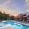 Sparkling swimming pool with Lush Landscaping