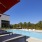 Sparkling swimming pool with Lush Landscaping